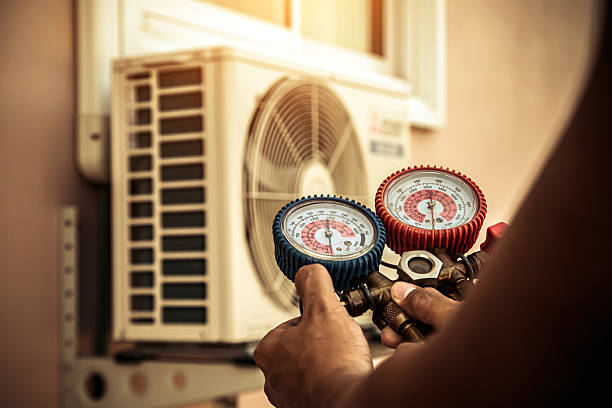 Professional Heat Pump Repair technician working in Lansdowne, MD